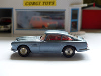 218 Aston Martin in silver with red interior