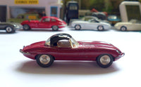 307 Jaguar E type in plum red with black hard top