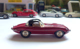307 Jaguar E type in plum red with black hard top