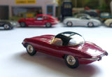307 Jaguar E type in plum red with black hard top