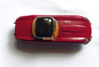 307 Jaguar E type in plum red with black hard top
