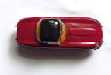 307 Jaguar E type in plum red with black hard top