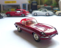 307 Jaguar E type in plum red