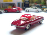 307 Jaguar E type in plum red